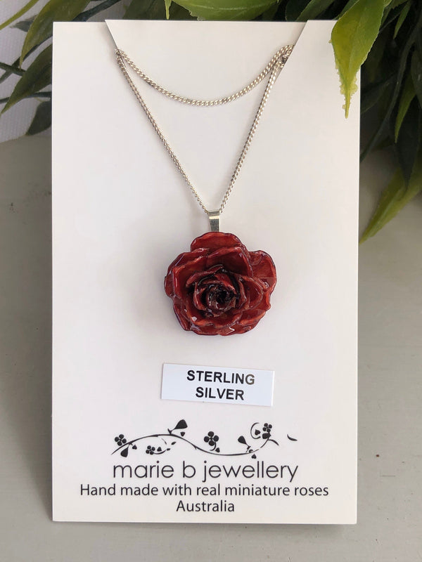 Sterling silver necklace with a real Rose Pendant